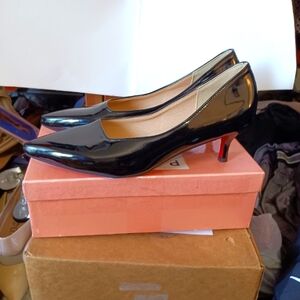 Black patent red bottoms